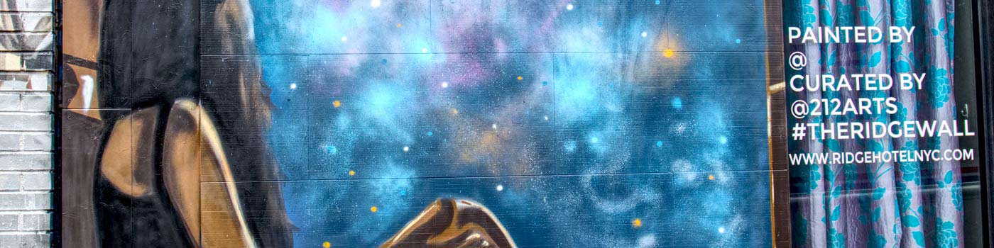 wall mural of a young woman staring at stars in the night sky
