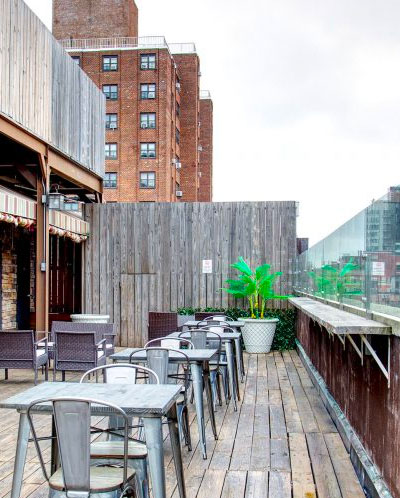 Young man and woman sitting at a bar