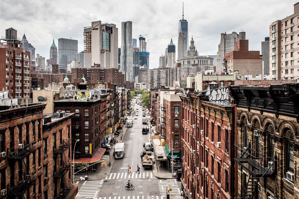 Historic buildings against new high rises in Lower East Side, NYC