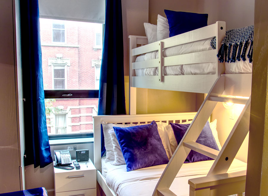 Room with window and bunk beds